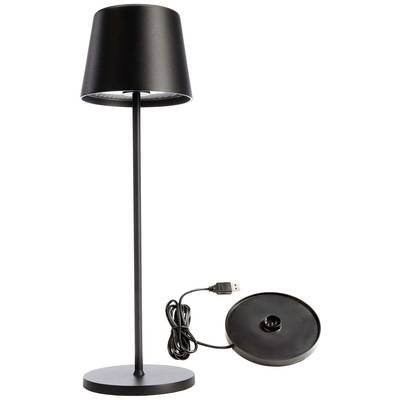 Lampe de table noire à base ronde et câble de connexion USB, adaptée à un intérieur moderne.