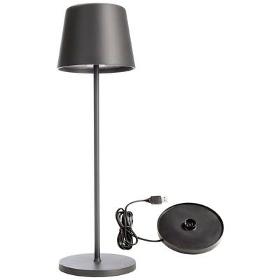Une lampe de table noire avec câble USB et socle amovible. Design moderne, adaptée à l'intérieur.