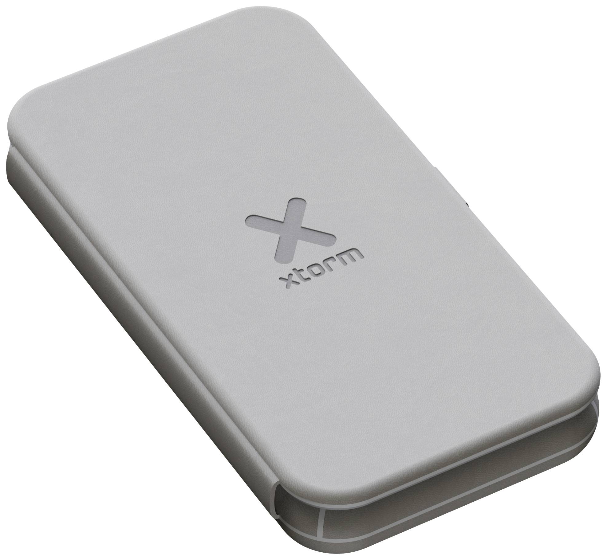 Chargeur portable gris avec le logo 'xtorm' au centre, de forme rectangulaire, à surface lisse, conçu pour recharger des appareils mobiles.