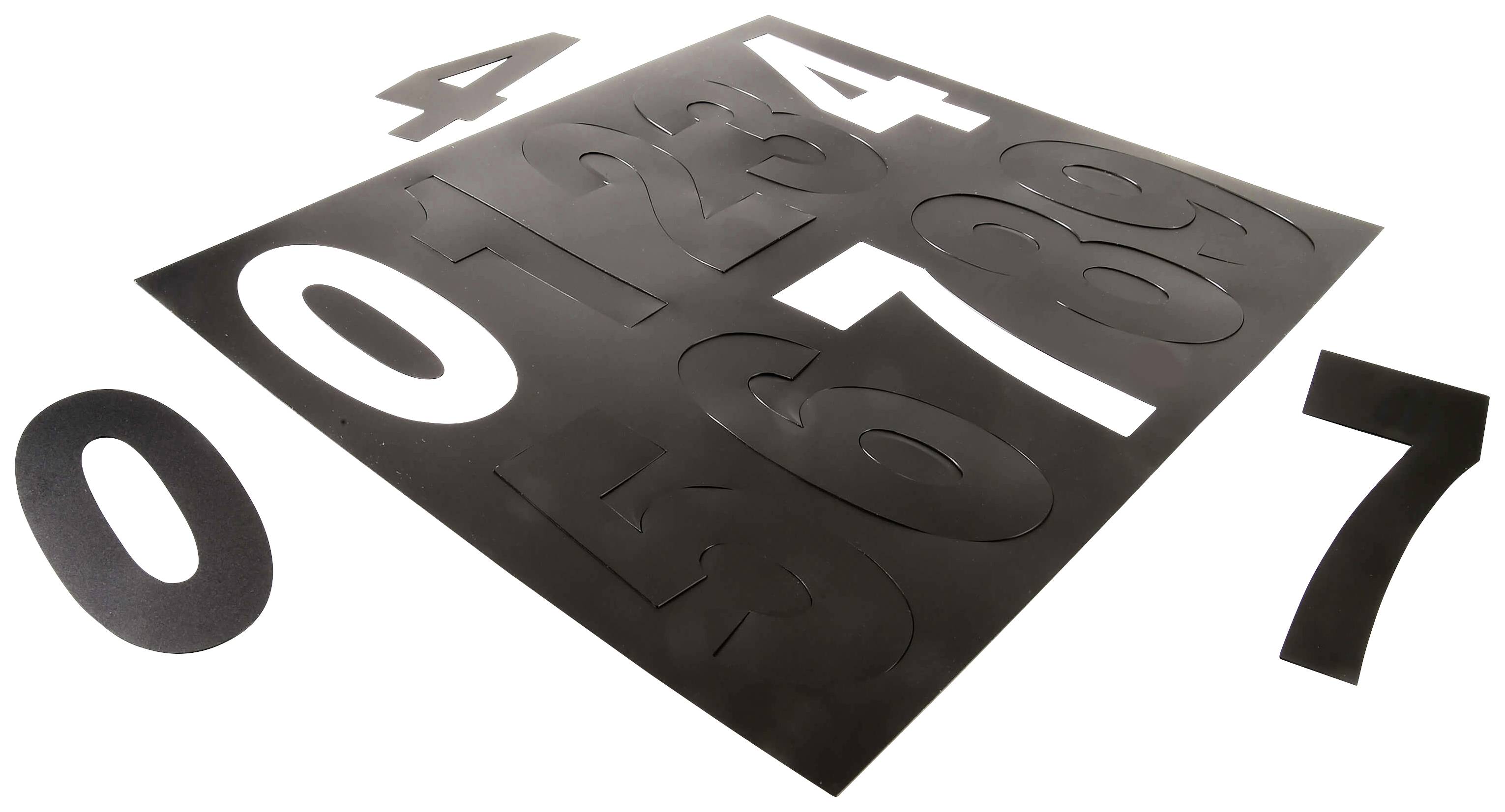 Pochoirs en noir pour les chiffres 0 à 9 sur une table, numérotés.