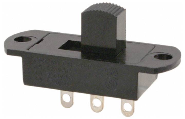 'Commutateur à curseur noir avec trois broches métalliques et des trous de vis sur les côtés, utilisé pour contrôler les circuits électroniques.'