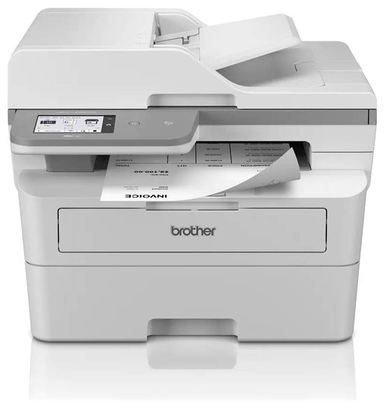 Un imprimante laser multifonction gris imprime un document sur lequel le mot 'INVOICE' est partiellement visible.