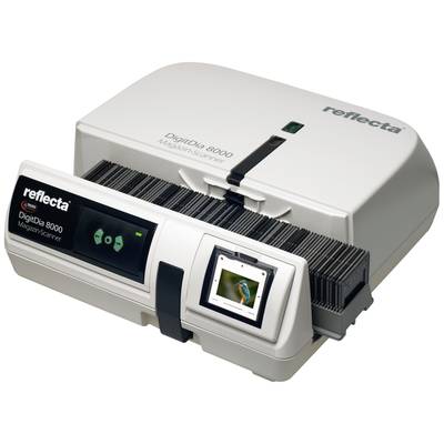 Scanner de magazine 'Reflecta DigiDia 8000' posé sur une table, avec un magasin de diapositives chargé et un écran. Appareil destiné à la numérisation de diapositives.