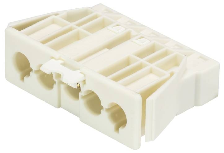 Un connecteur ou bloc de jonction beige, rectangulaire, avec plusieurs trous de connexion, utilisé pour les connexions électriques.