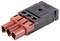 Connecteur 'Stäubli CombiTac', rectangulaire, rouge et noir, avec deux prises. Utilisé pour des connexions modulaires dans des applications industrielles.