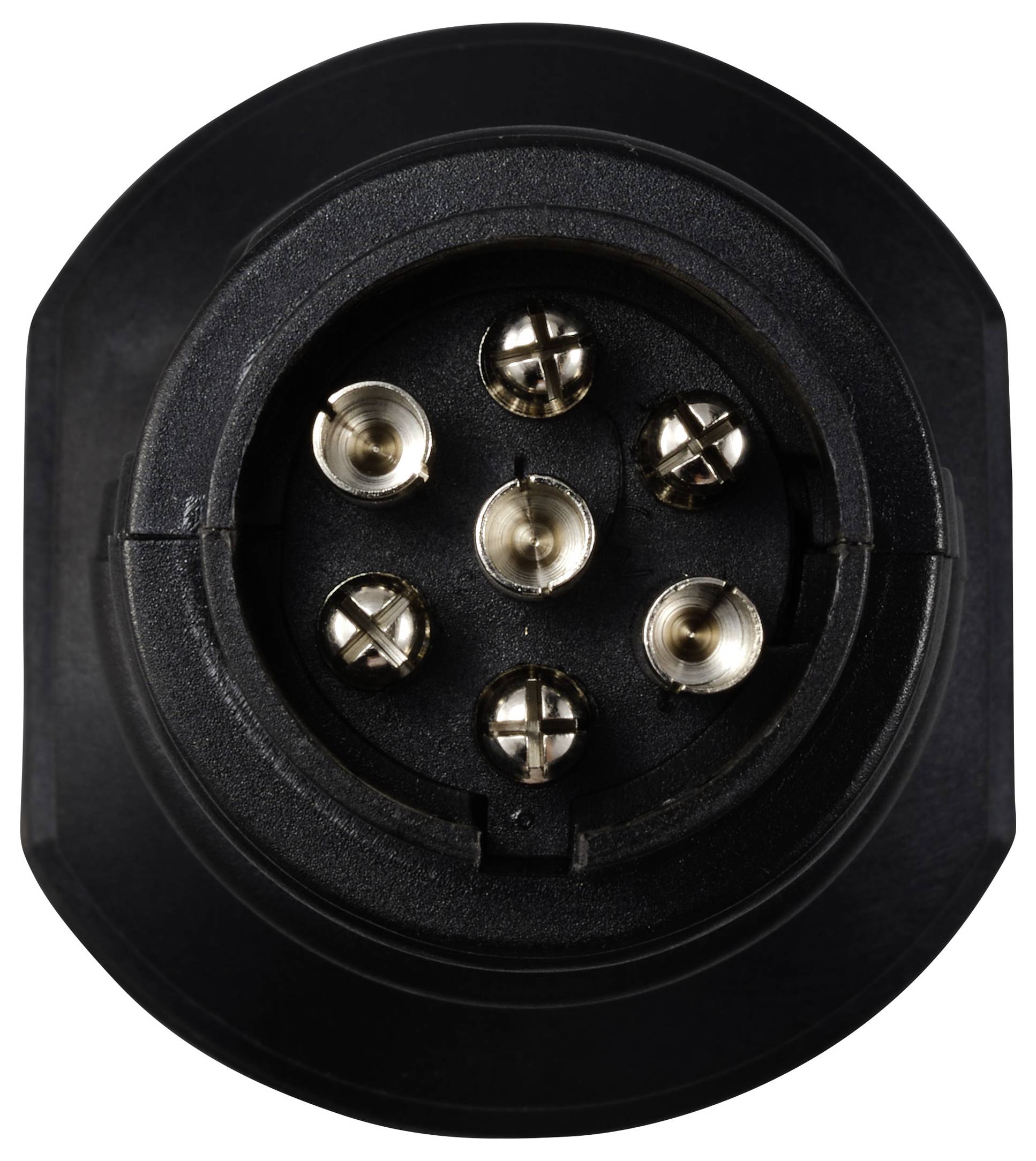 'Gros plan d'un connecteur électrique rond noir avec six broches métalliques disposées de manière symétrique.'