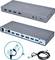 Un hub USB gris avec plusieurs ports, comprenant HDMI, USB-C, Ethernet et Audio. Inclut également un câble avec des connecteurs USB-C et USB-A.