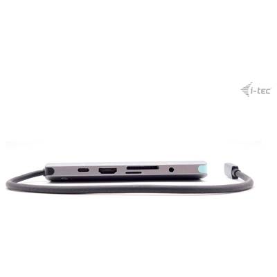 Hub USB-C plat avec plusieurs options de connexion, comprenant HDMI, USB, lecteur de cartes et prise audio. Câble connecté.