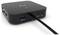 Une station d'accueil noire avec plusieurs ports USB, comprenant un port USB 3.0, un port USB-C et une prise d'alimentation.