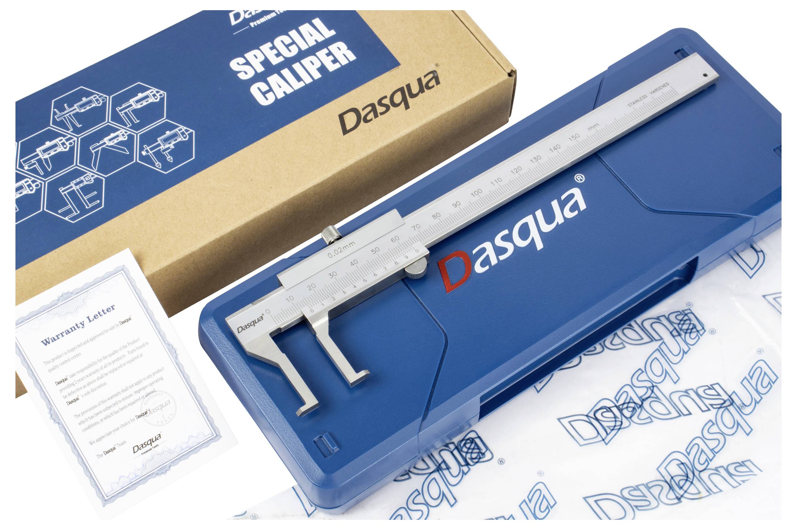 Un pied à coulisse bleu sur un étui bleu, à côté d'une carte de garantie et de l'emballage d'origine portant l'inscription 'SPECIAL CALIPER'.