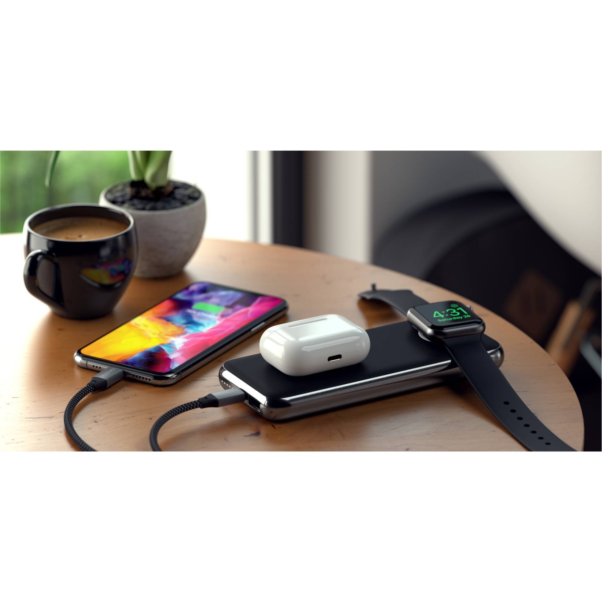 Un smartphone, une smartwatch et des écouteurs sont en charge sur une table. À côté, une tasse de café et une petite plante sont placées près de la fenêtre.