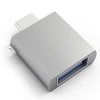 Un adaptateur USB-C vers USB-A argenté avec une finition métallique, permettant de connecter des appareils USB-A aux ports USB-C.