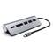 Hub USB-C en argent avec plusieurs ports, comprenant USB-A, HDMI et lecteur de carte SD. Câble fixé. Idéal pour une connectivité étendue.