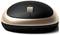 Souris d'ordinateur sans fil élégante en noir et or, dotée d'un bouton central et d'un emplacement de charge à l'avant. Forme moderne et ergonomique.