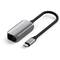 Adaptateur USB-C vers Ethernet en aluminium de la marque Satechi, permet des connexions réseau filaires, compact et portable.