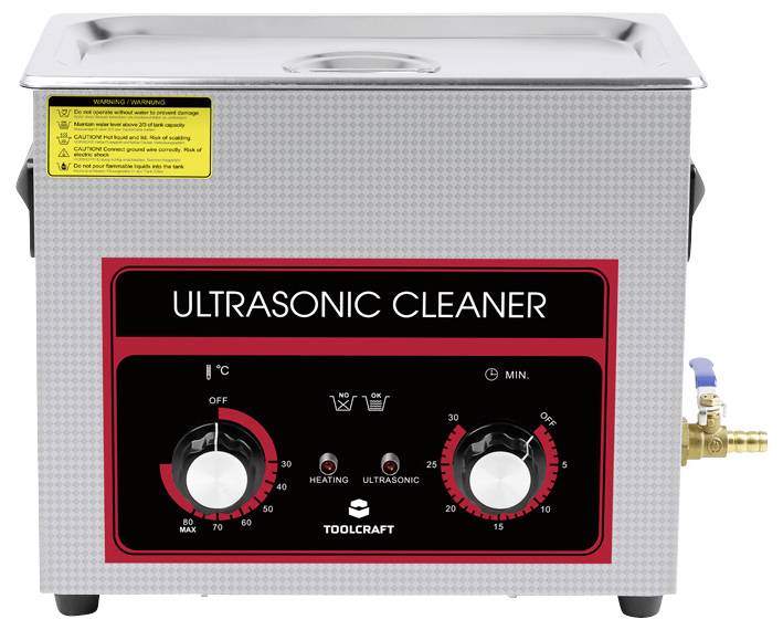 Nettoyeur à ultrasons avec réglages de température et de temps. Appareil en métal avec affichages pour 'Chauffage' et 'Ultrason'. Idéal pour le nettoyage.