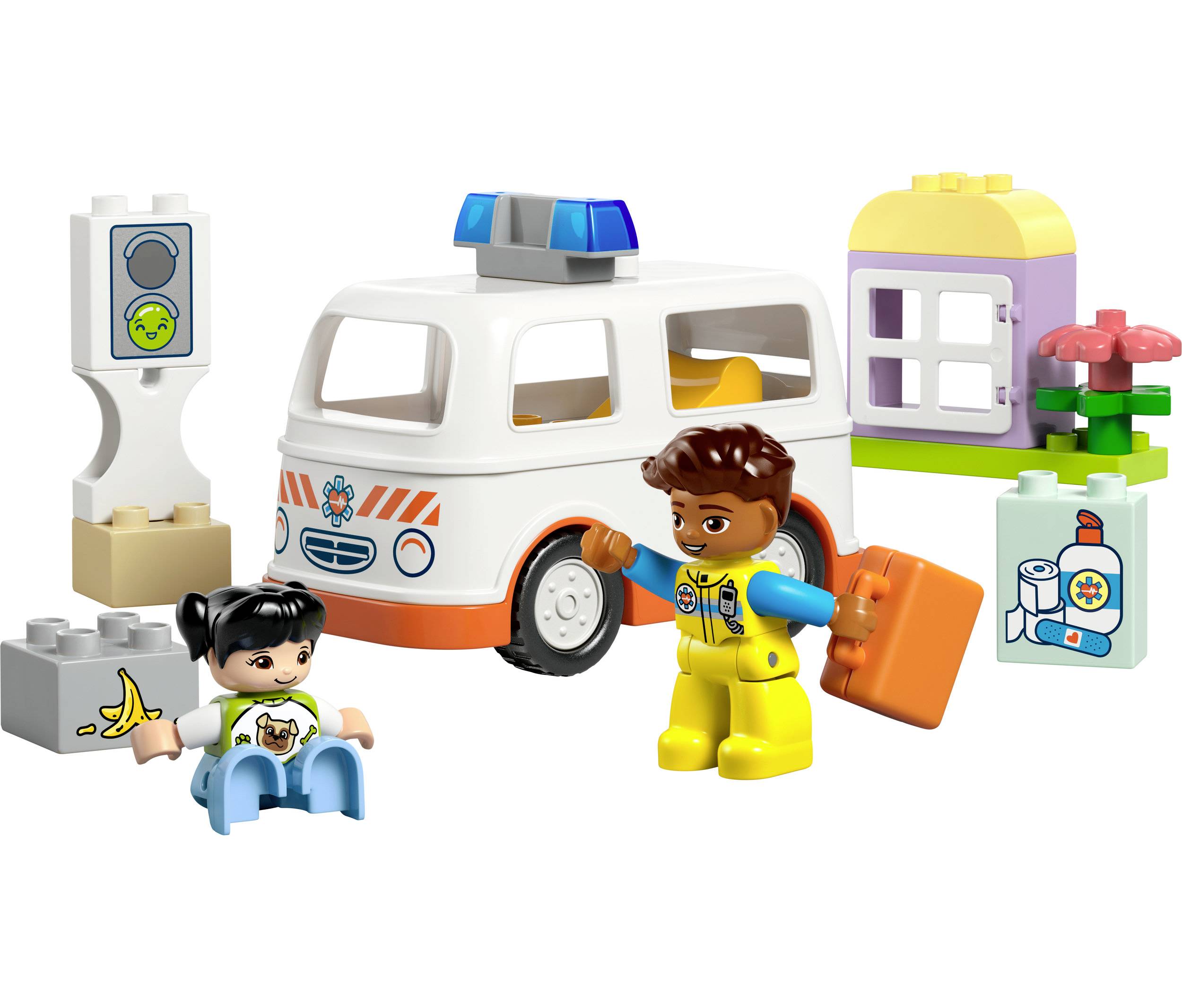 Ensemble de jouets comprenant une ambulance, deux personnages, des blocs et un signal de circulation. Un personnage tient une valise et porte un uniforme.