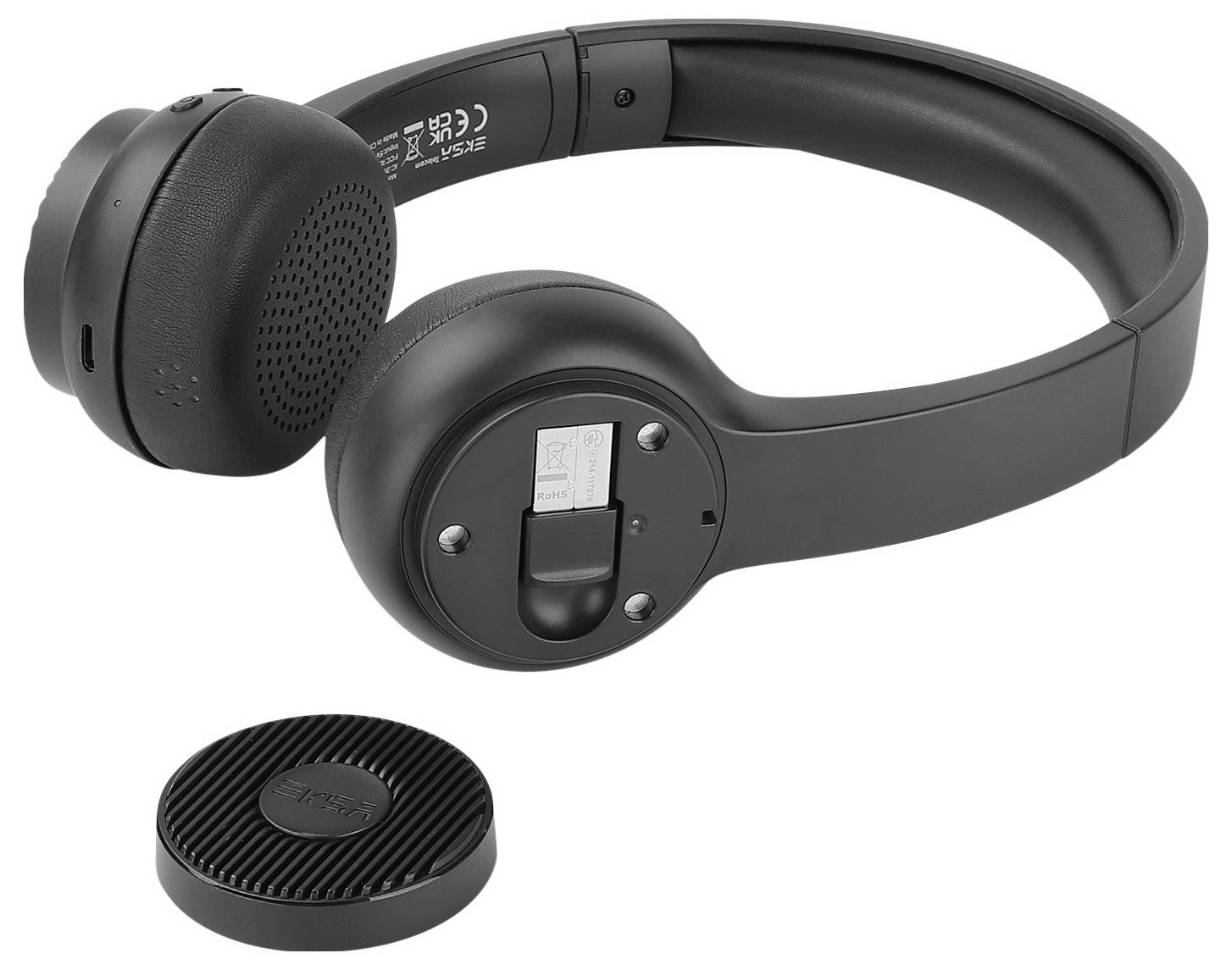 Casque noir sans fil avec des écouteurs amovibles et un chargeur en dessous.