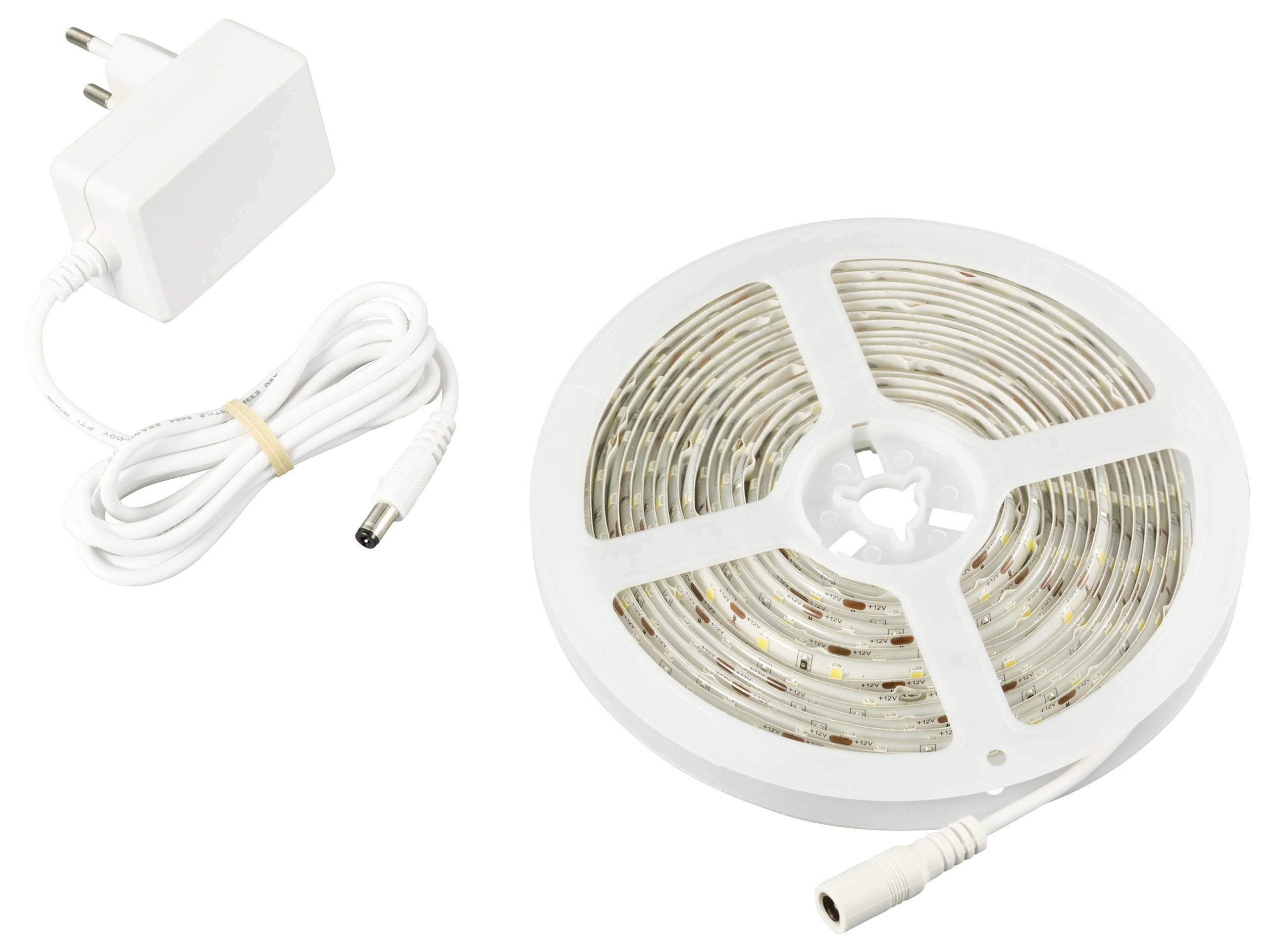 Ruban lumineux LED avec adaptateur secteur et câble, enroulé, prêt à être installé. Idéal pour un éclairage d'ambiance.