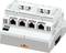 Commutateur réseau avec six ports Ethernet pour montage mural. Adapté aux systèmes de contrôle industriels et à la communication réseau.