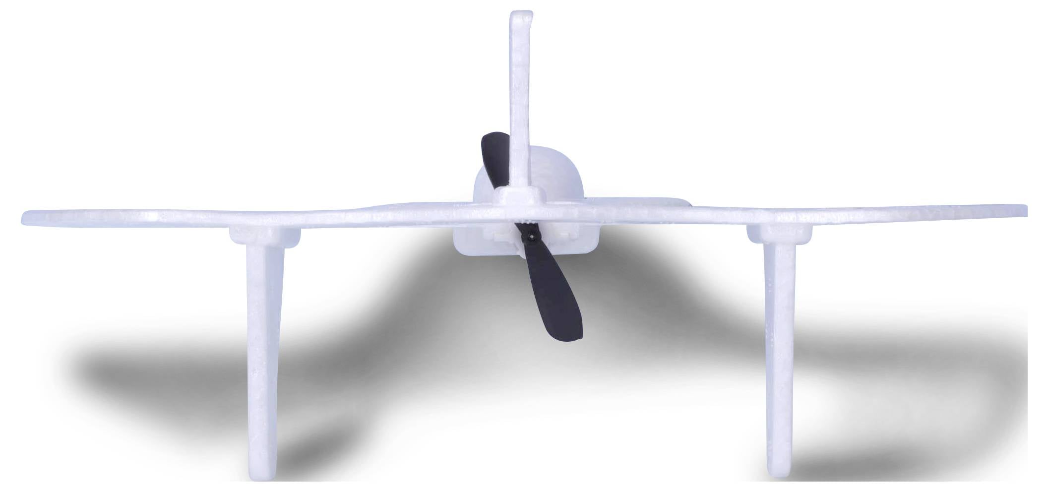 Un simple avion-jouet en mousse avec une hélice et deux longues cornes sur un fond blanc, avec une ombre en dessous.