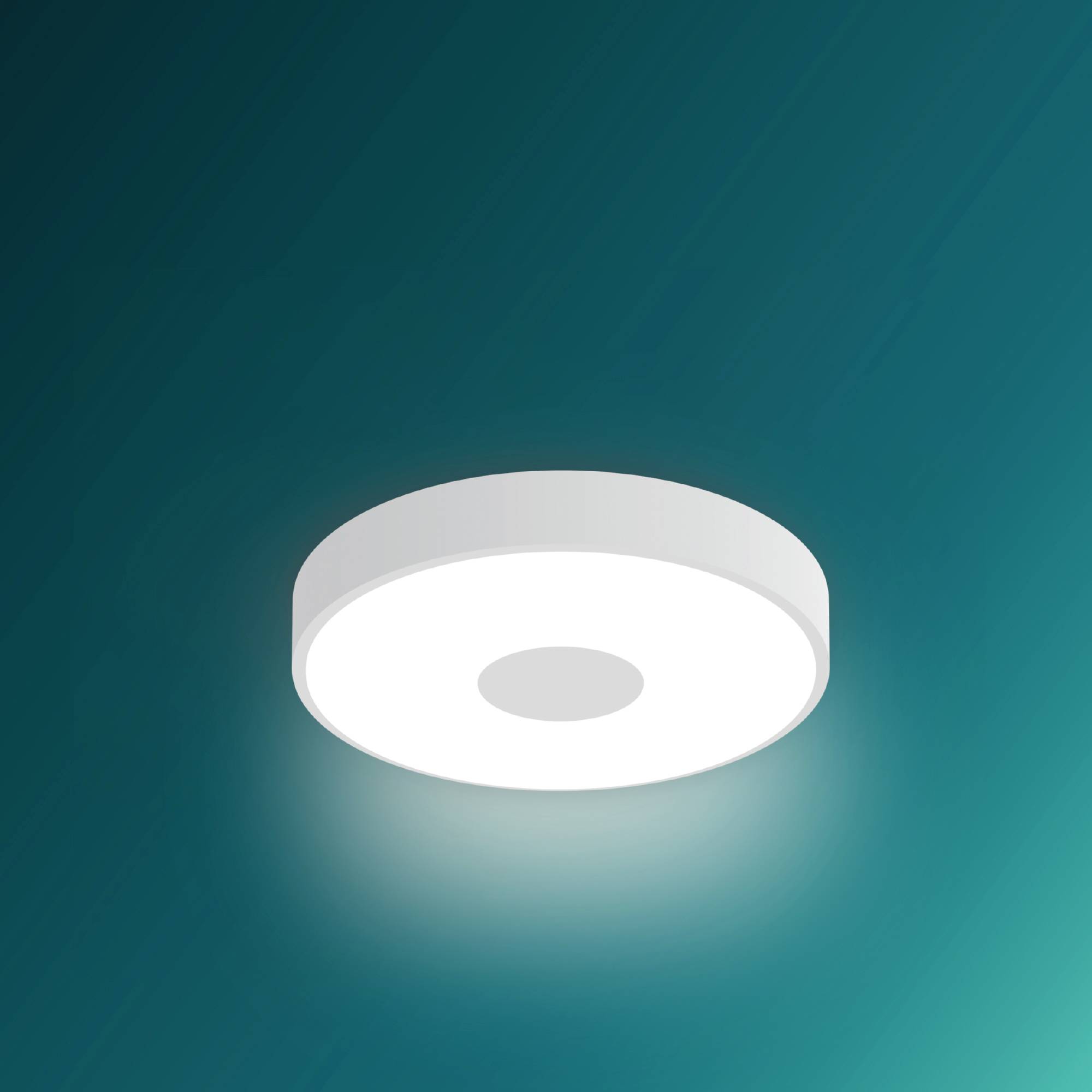 Un projecteur de plafond LED rond sur un fond vert, produisant une lumière indirecte.