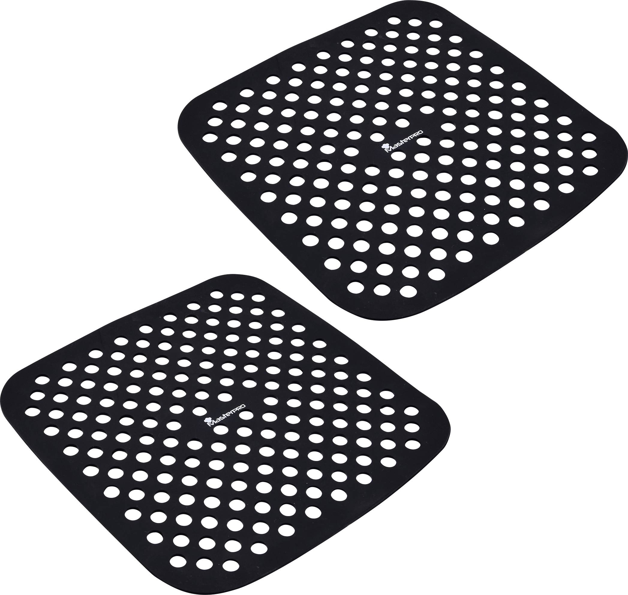 Deux tapis antidérapants en silicone noir avec des points blancs. Idéaux pour une adhérence sécurisée sur les surfaces.