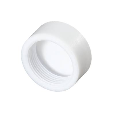 Un bouchon à vis cylindrique blanc sur un fond noir.