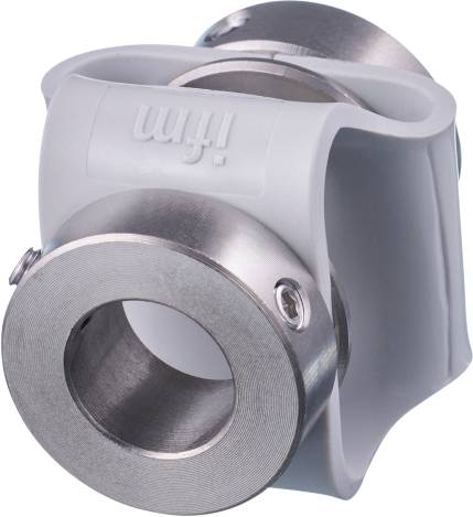 Un palier métallique avec des ouvertures cylindriques, fixé dans un support gris.