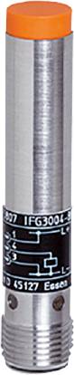 Un cylindre d'argent posé sur un socle noir. Sur le socle, des chiffres et des lettres blancs sont inscrits : « 007 IFG3004 B ».
