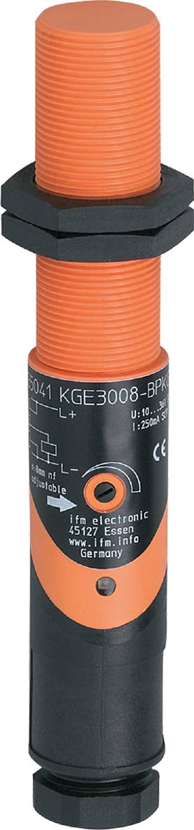 Capteur cylindrique avec boîtier orange et marquage noir, montrant les spécifications techniques et un schéma de connexion.