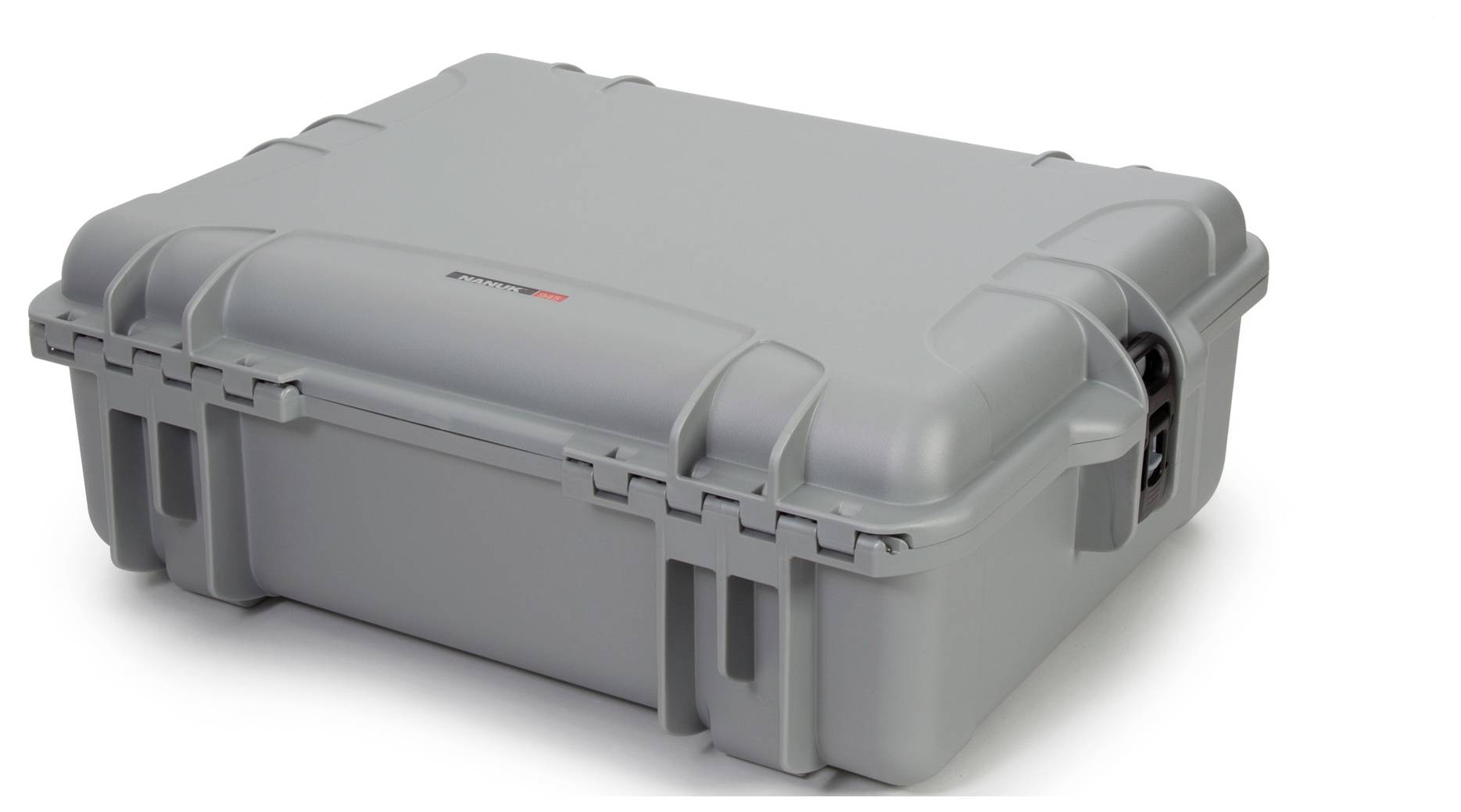 Un boîtier de protection gris, robuste, avec des angles arrondis et une poignée de transport. Adapté pour le transport sécurisé d'appareils sensibles.