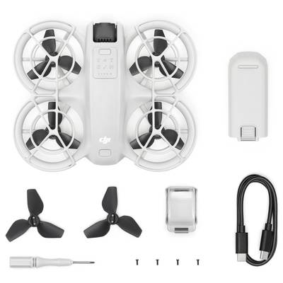 Petit drone à quatre hélices, hélices de rechange, batterie, tournevis, vis et câble de charge.