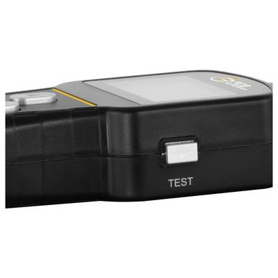 Appareil de test portatif noir avec un bouton argenté étiqueté « TEST » et un petit écran sur le dessus.