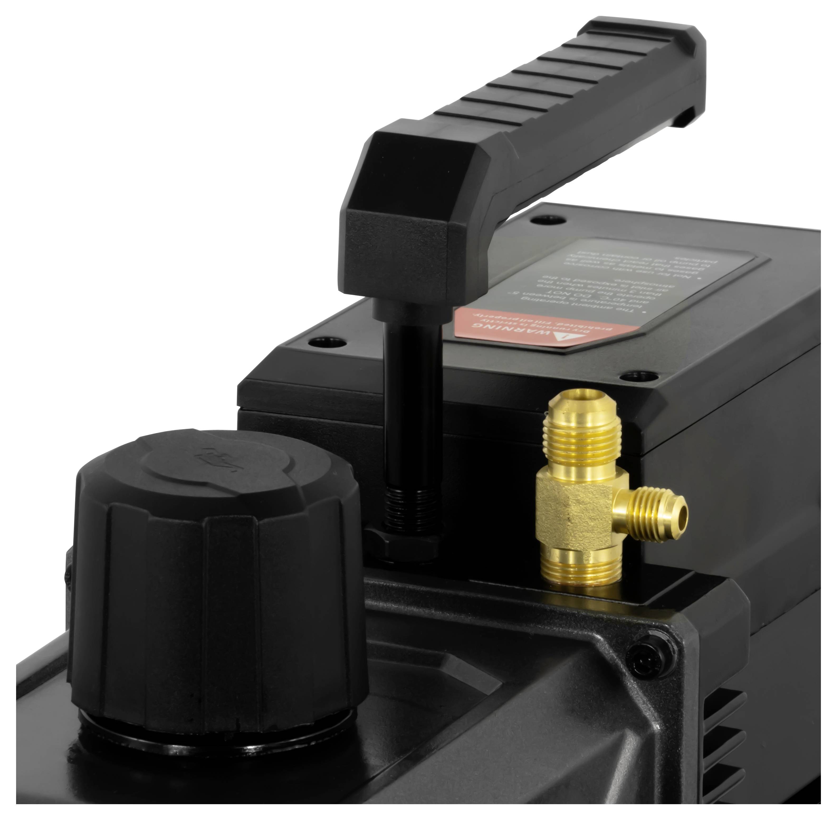 Un appareil électroménager noir et jaune avec un grand bouton rotatif et une poignée. Un raccord en laiton est visible sur le côté droit.