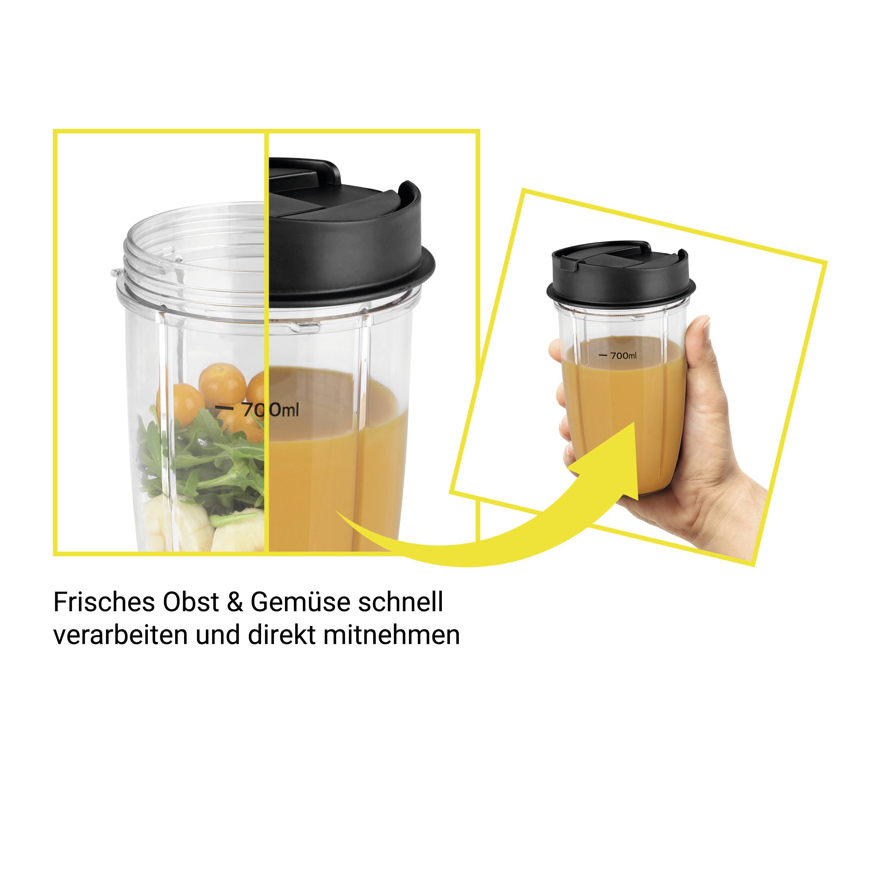 Un récipient de mixeur contenant un jus fraîchement mélangé de fruits et de légumes. Une main tient le récipient, prêt à être emporté.