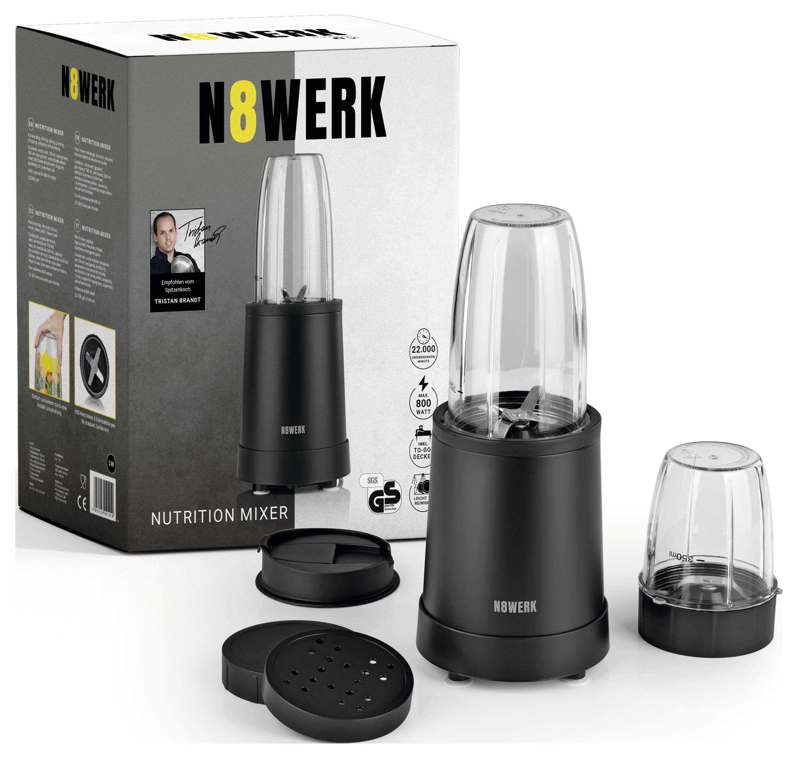 Mixeur nutritionnel noir N8WERK avec deux récipients de mixage et couvercles. L'emballage présente les informations du produit et une photo d'un homme.