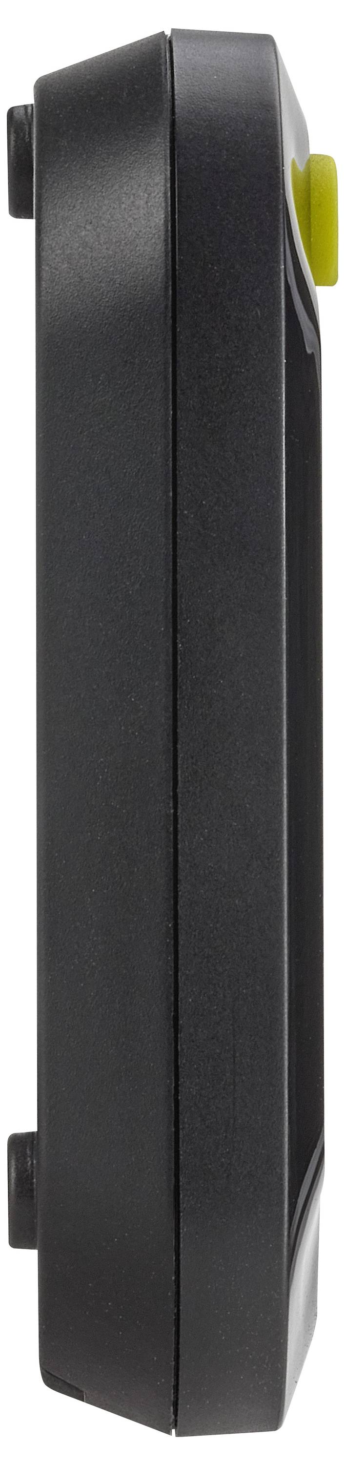 Appareil noir, rectangulaire, vu de profil, avec un bouton jaune dans le coin supérieur droit.