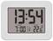 Horloge numérique affichant '13:54', réveil réglé sur '7:00', température '22,6°C'.