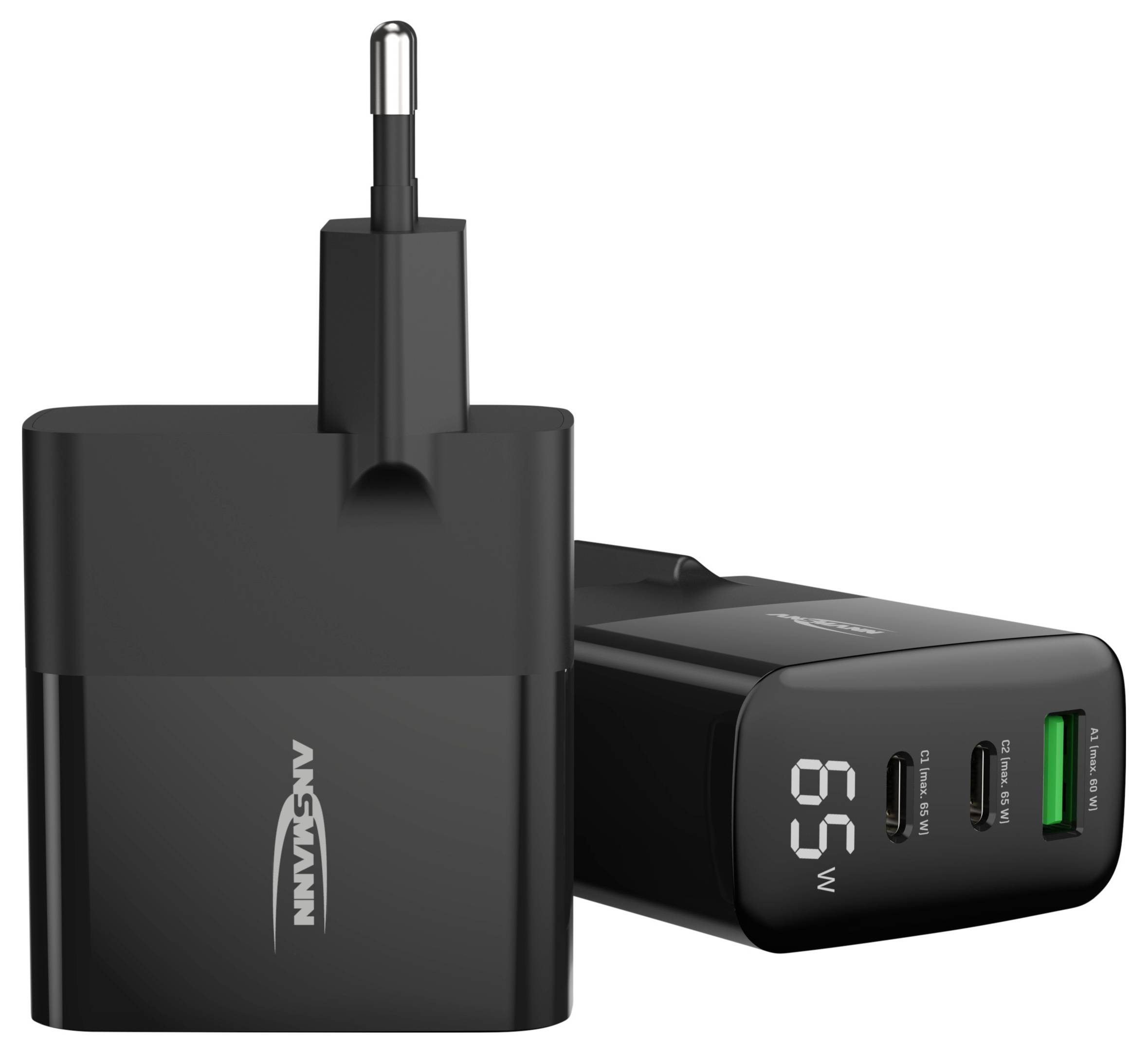 Bloc d'alimentation noir avec deux ports USB et indication de 65W. Prise secteur à gauche, étiquetage et ports visibles à droite.