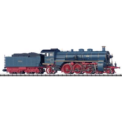 Un modèle d'une locomotive à vapeur historique en bleu et rouge est posé sur un rail. Il présente des détails fins de la construction ferroviaire.