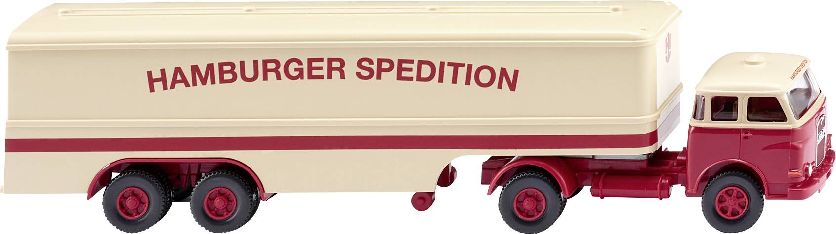 Un camion-modèle en beige et rouge portant l'inscription 'Hamburger Spedition' sur le côté de la remorque.