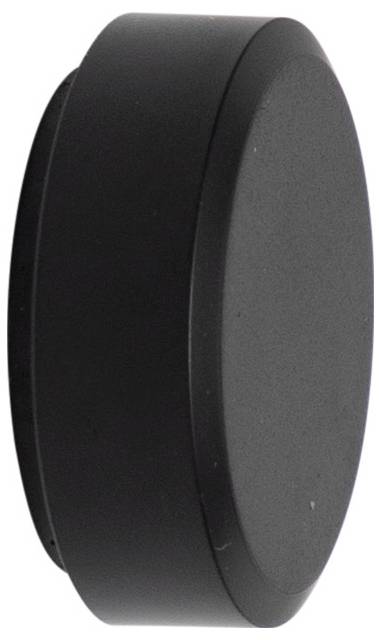 Palet de hockey noir debout, vu de côté, sur un fond blanc.