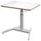 Table réglable en hauteur avec un plateau rectangulaire clair et des pieds en métal robustes, adapté aux environnements de travail flexibles.
