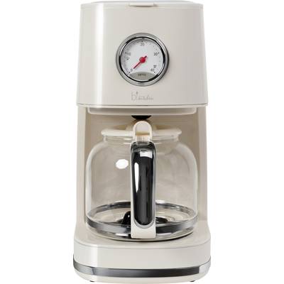 Machine à café beige avec carafe en verre et affichage analogique de la température, indiquant la quantité de café et la température actuelle.