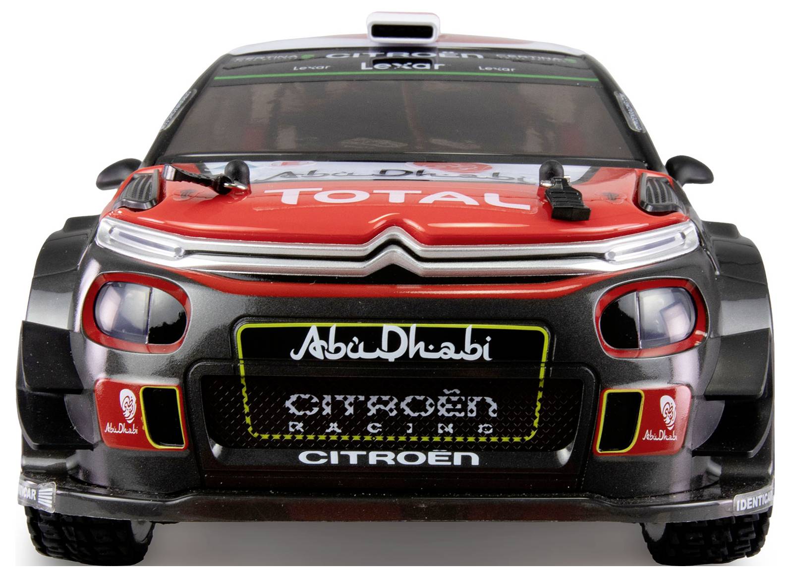 Une voiture de course Citroën avec des inscriptions de 'Abu Dhabi Racing' et 'Total' sur le capot et le pare-chocs avant.
