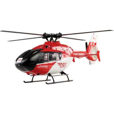 Hélicoptère de secours rouge et blanc de la 'DRF Luftrettung' sur fond blanc. Modèle d'un hélicoptère d'intervention.