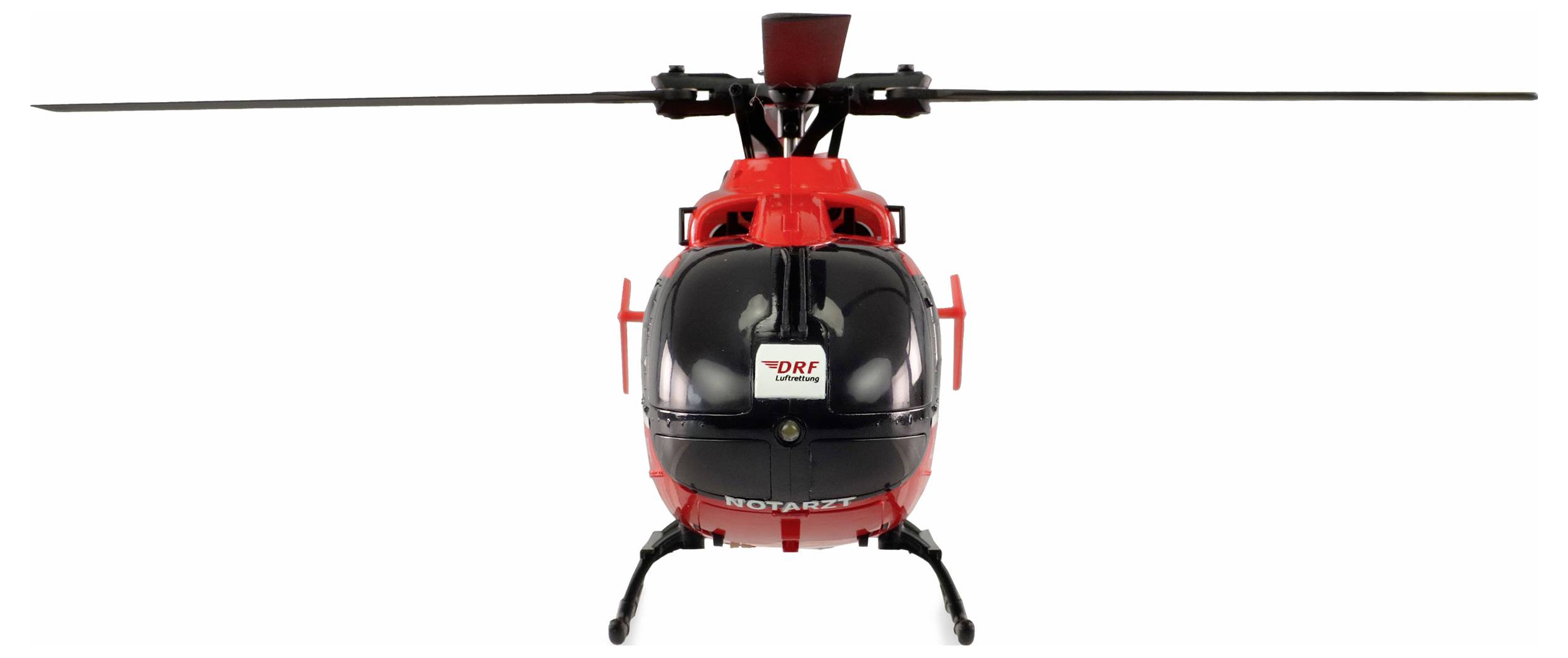 Un hélicoptère de modèle rouge vu de face, avec l'inscription 'DRF' sur le pare-brise.