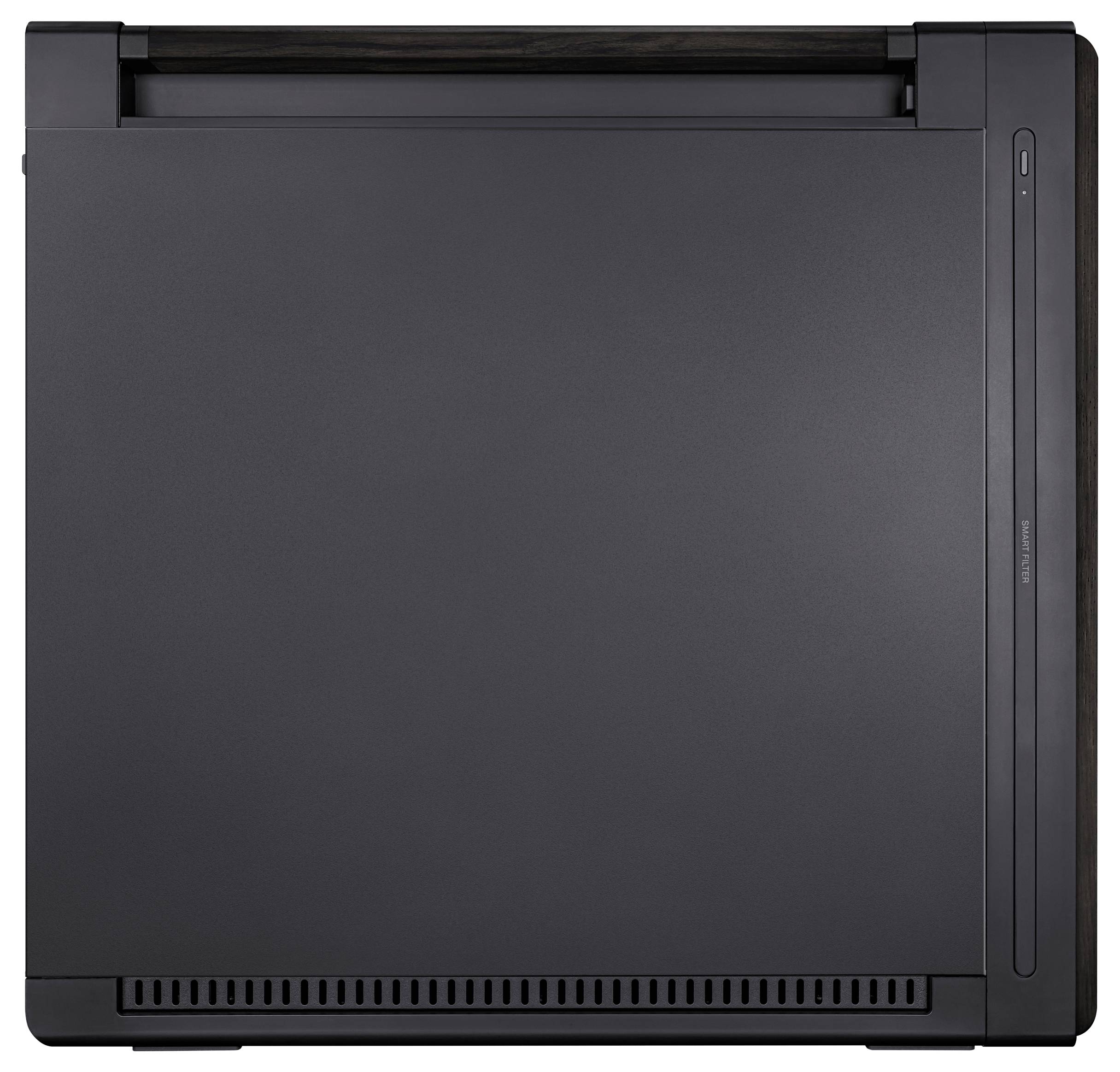 Un appareil électronique noir et carré au design minimaliste. Aucun bouton de commande ou port visible.