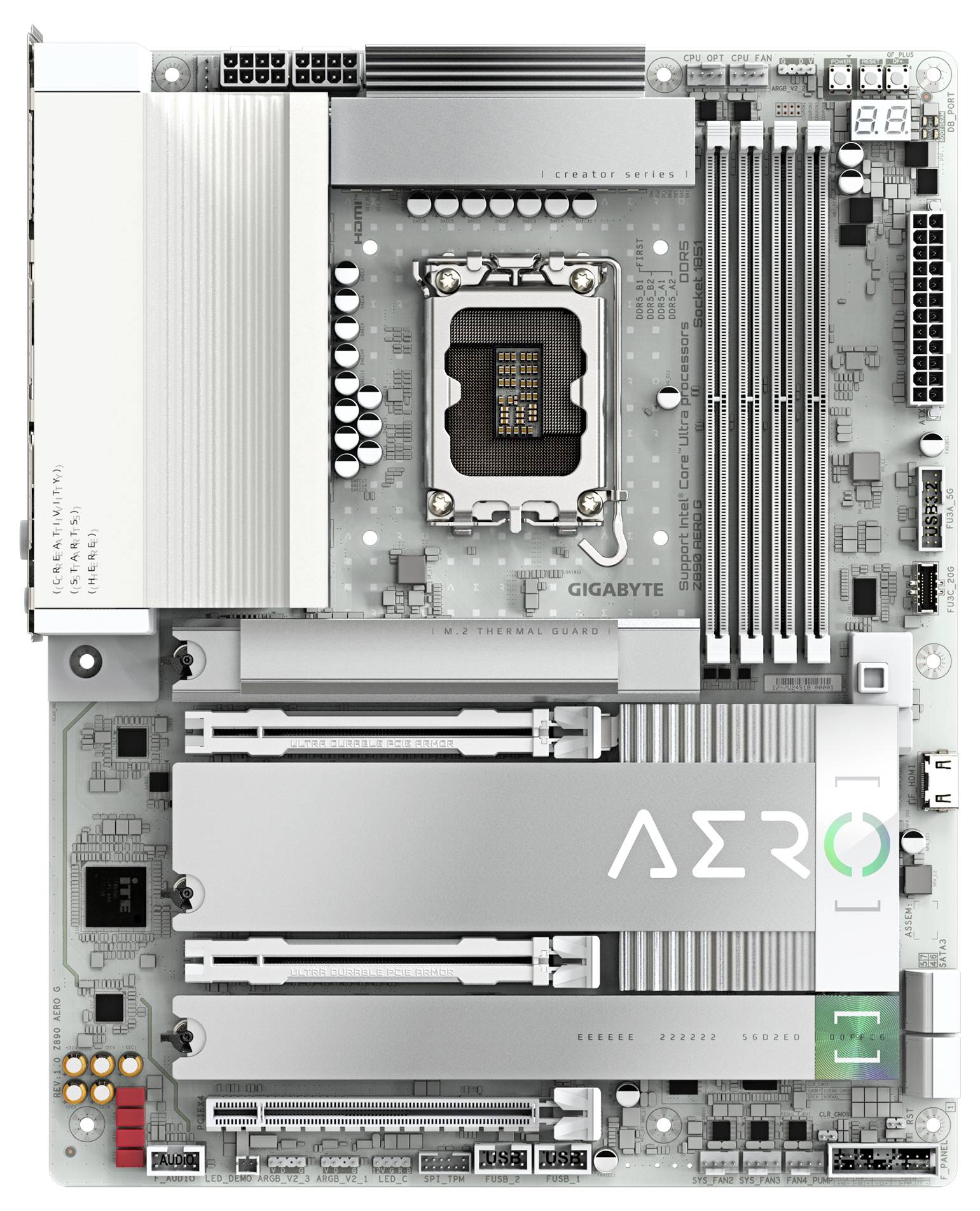 Une carte mère d'ordinateur avec un système de refroidissement argenté, portant le marquage 'AERO'. Des emplacements de RAM visibles et un socket de processeur au centre.
